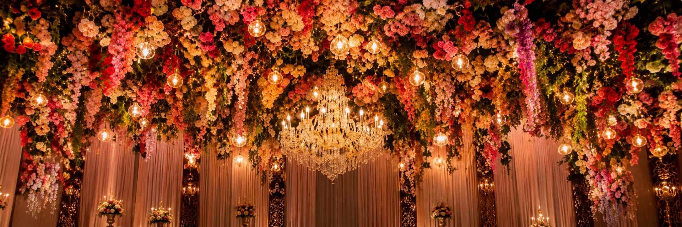 Dense fresh flower ceiling draping